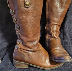 Leather knee high boots.